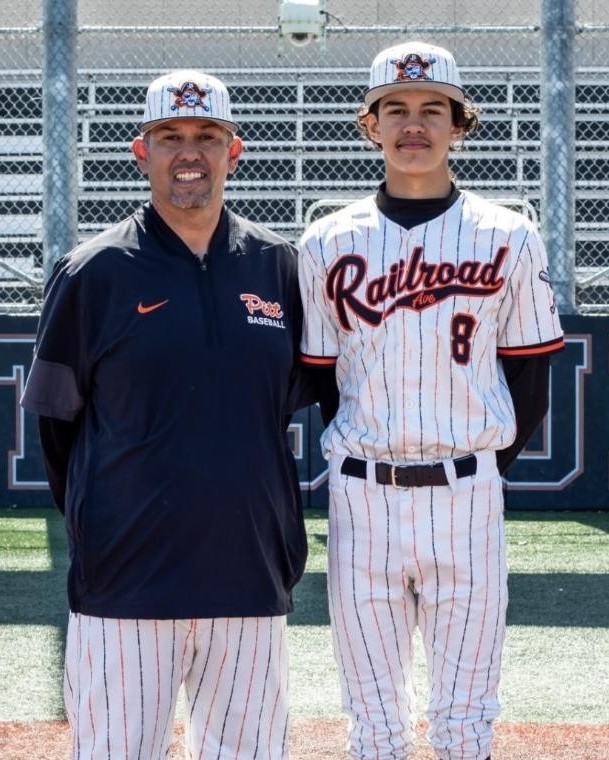 Coach PJ Garcia with a Pittsburg player